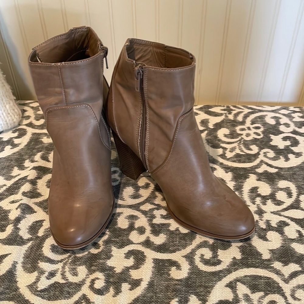 Taupe heeled boots gently worn